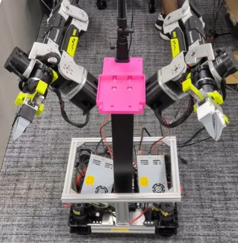 Dual reBot arms mounted on a mobile robot base with pink printed bracket