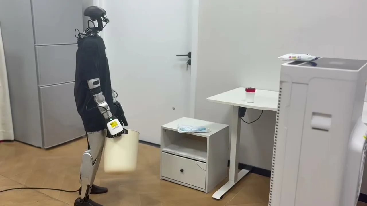 Unitree G1 carrying a trash bin through a household room in the official pick_garbage demo, exocentric view