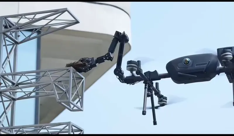 World's first aerial manipulation robot with robotic arms